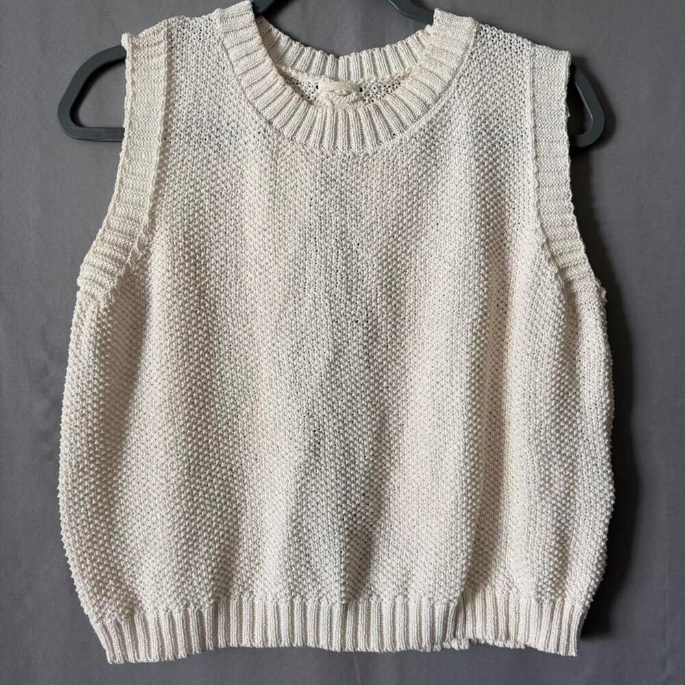 Cream knit polyester sweater vest